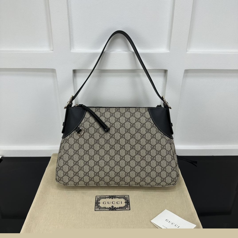 G*u*i top handle bags